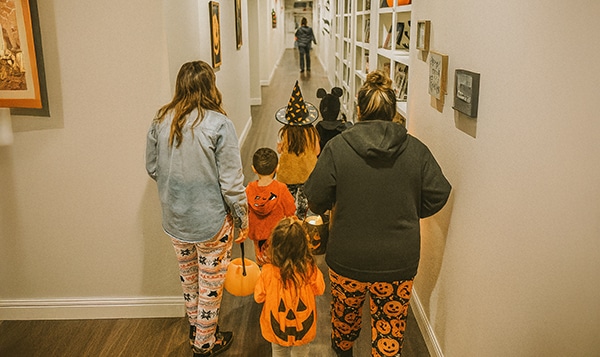 Children Trick or Treating at the BeeHive Homes of Texas
